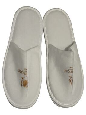 White and gold MSC Yacht Club slip-on slippers
